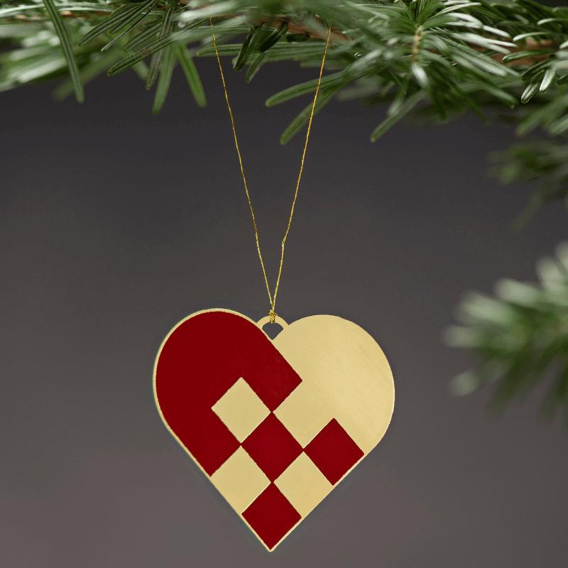 Ugly Duckli lille fladt metal hjerte med snor til ophæng