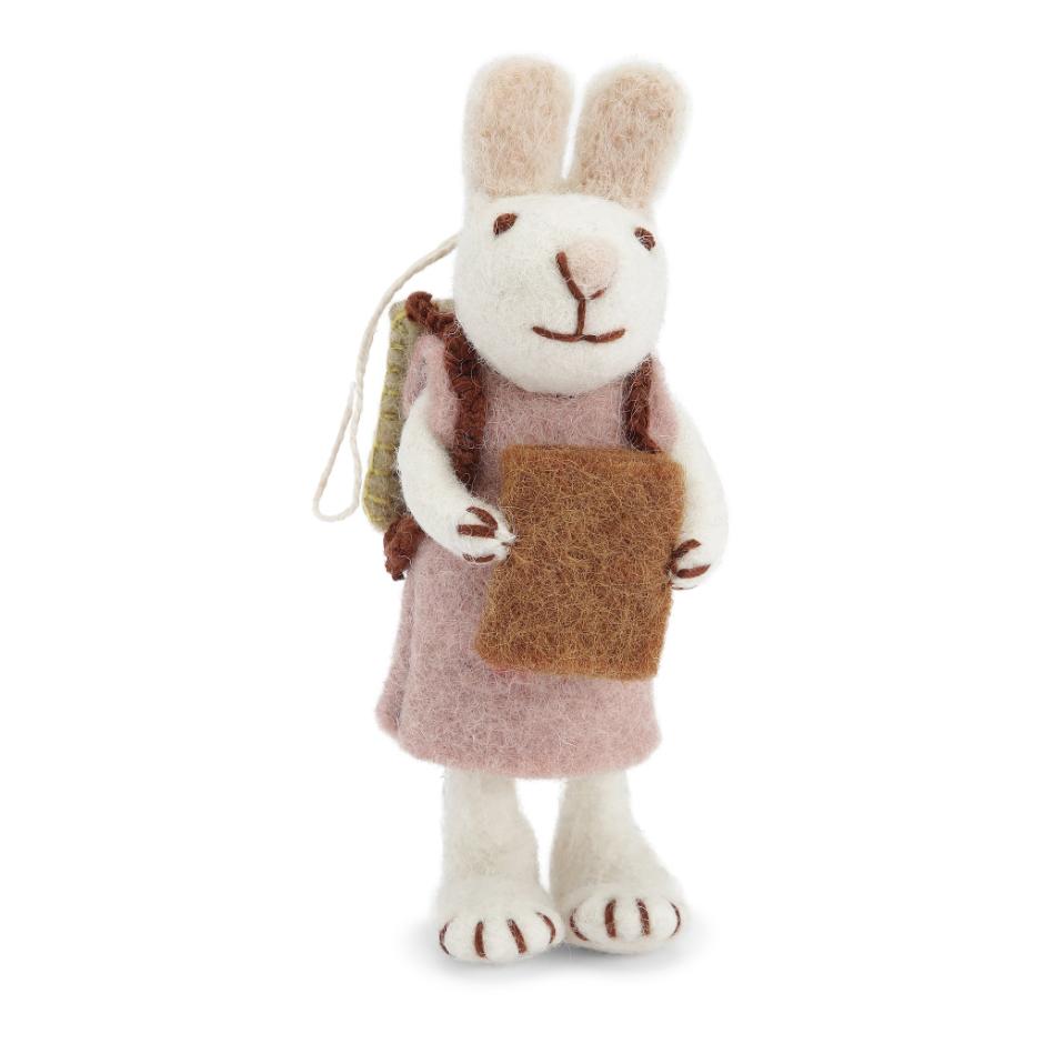 White bunny with lavender dress and book