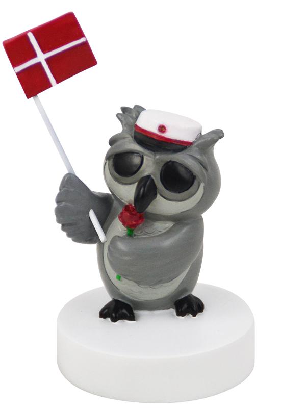 Ugle med rose til studenter