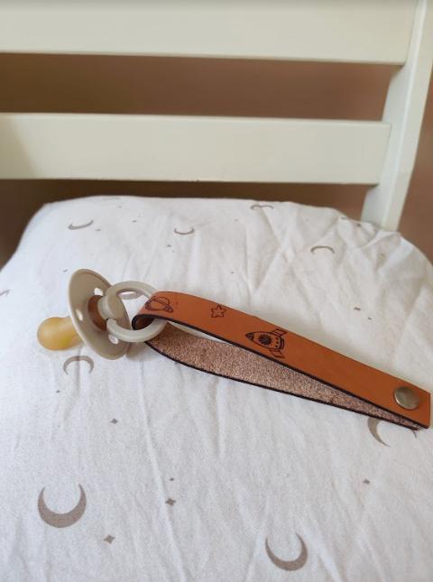 Sutteholder i vegetabilsk kernelæder - Astronaut